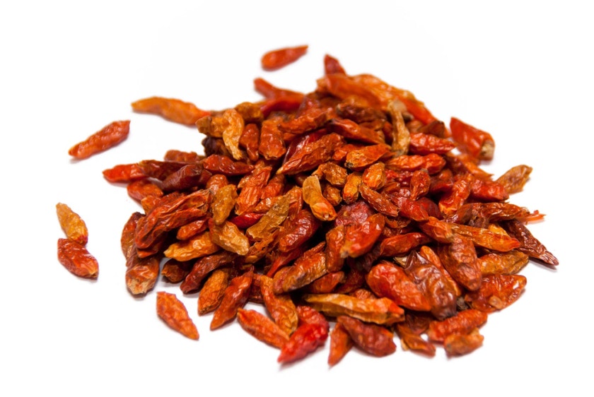 Cayena denominada Ojo de Pájaro . Pequeños pero picantes; muy picantes.